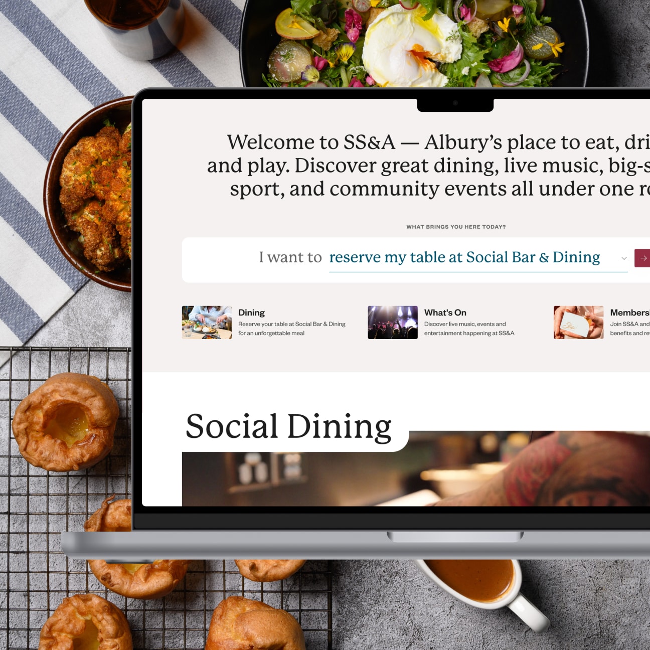 SS&A Club Social Dining page shown on a laptop mockup